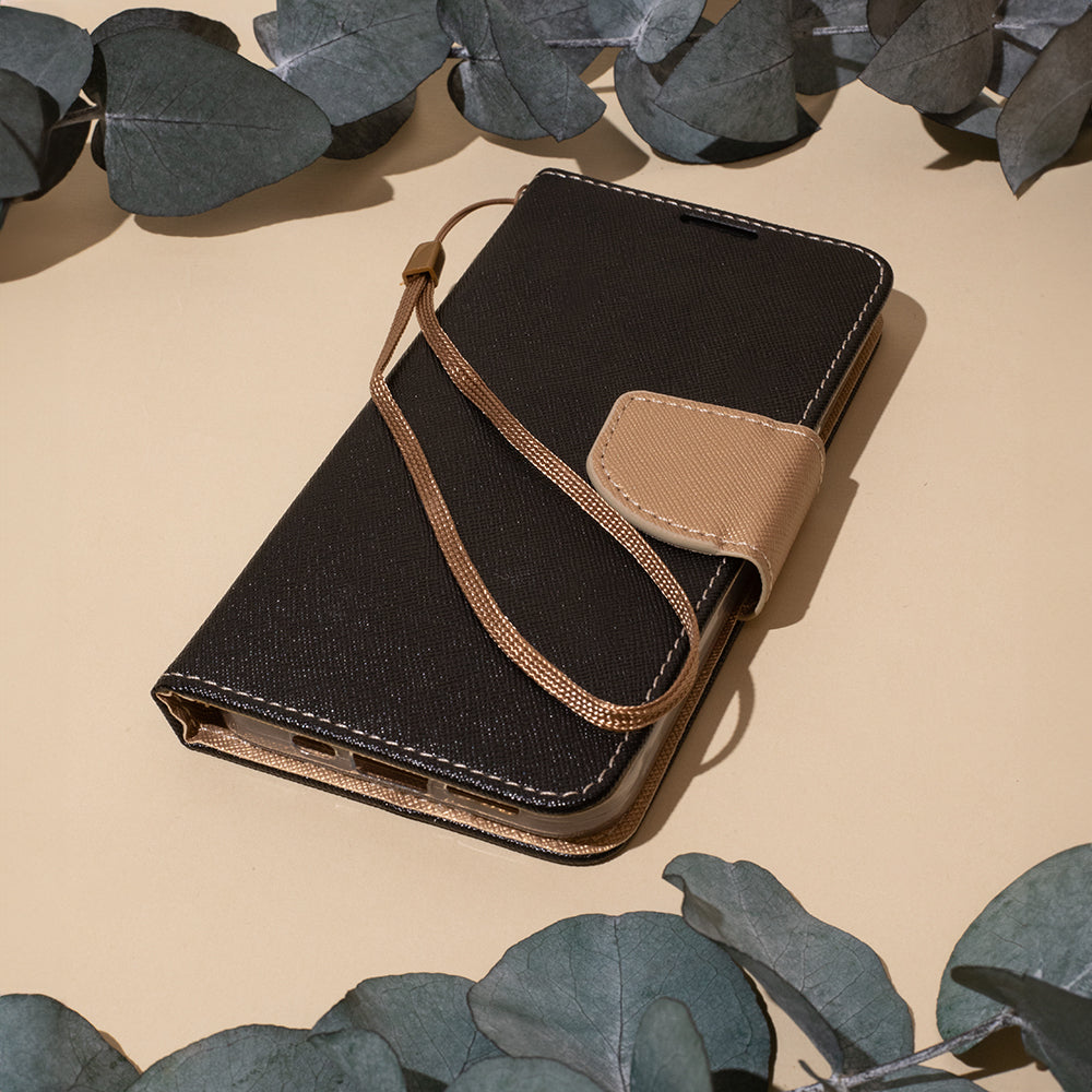 iPhone 16 Pro max flipcover Fancy Sort/Guld